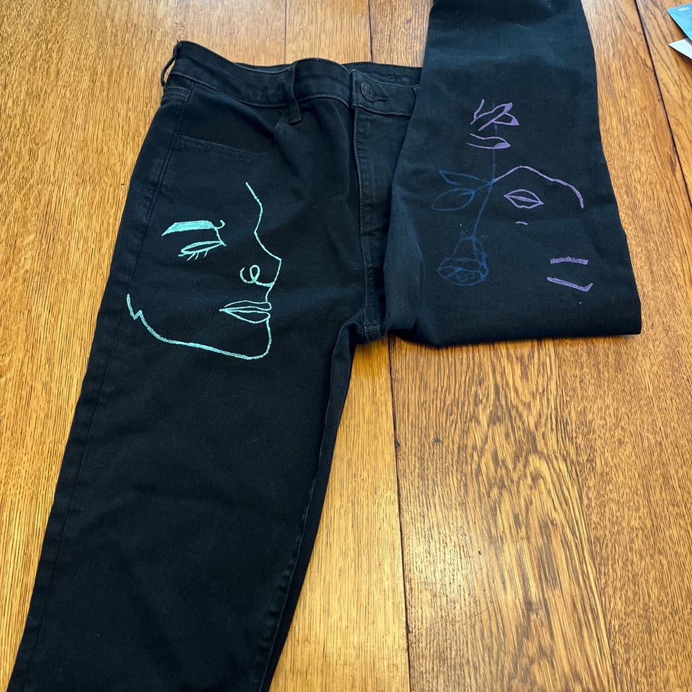 American eagle, custom-made black jeans, size  12 regular. Like new.